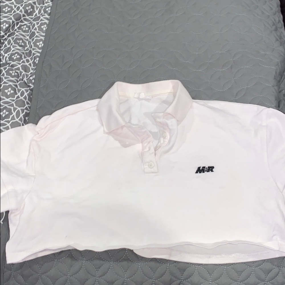 Cropped mistress rocks polo top